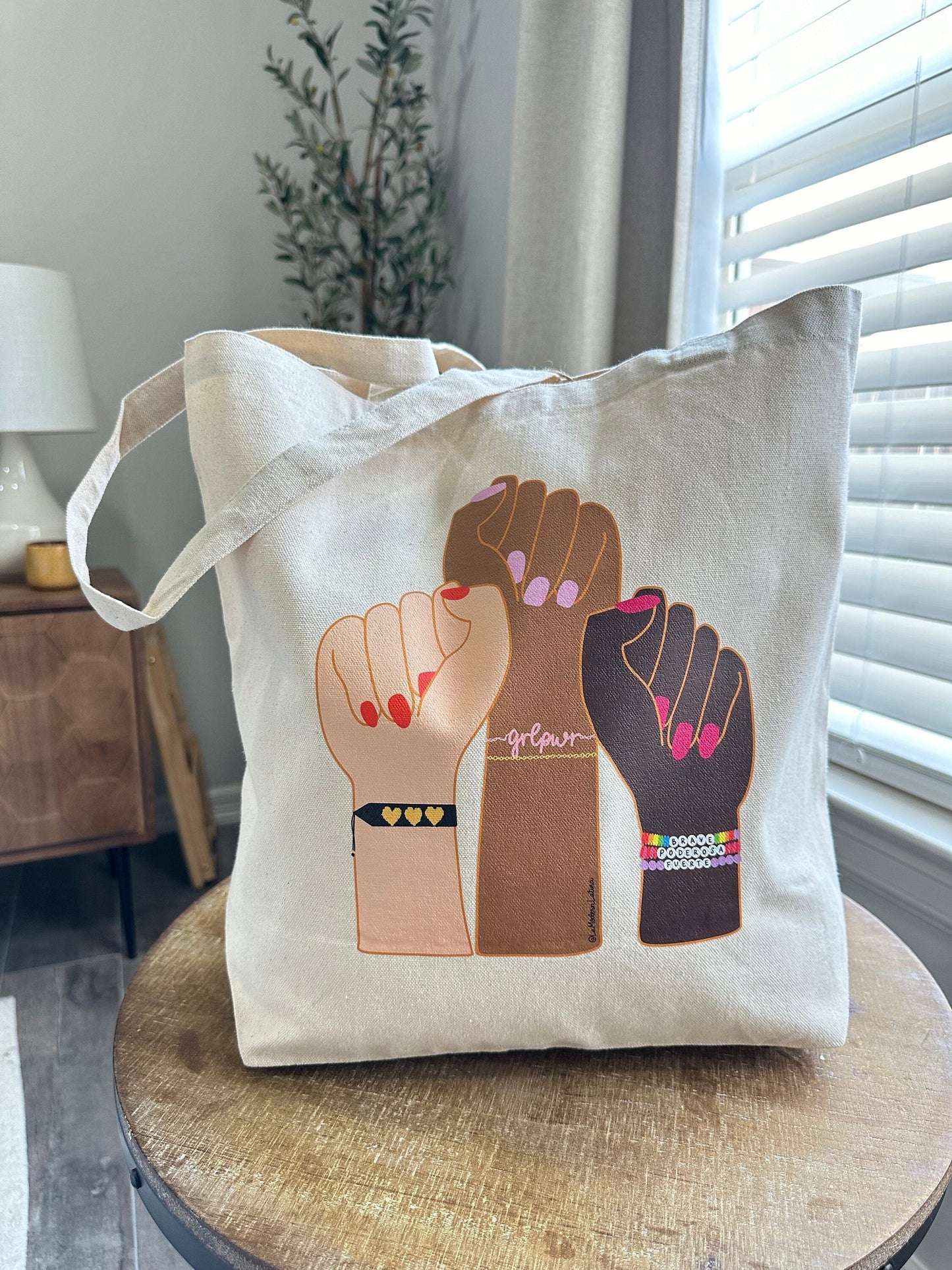 Feminist fists tote bag